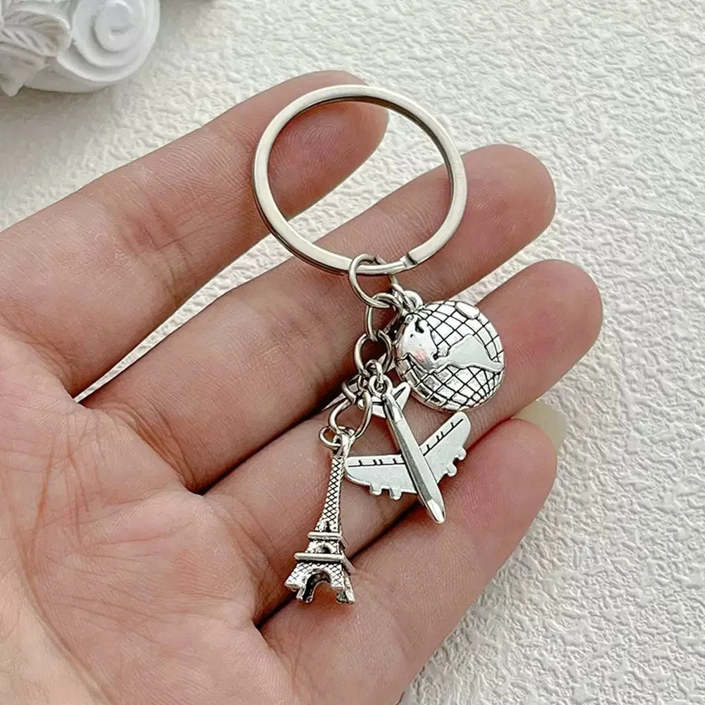 Elevate Your Style with the Luxe Tassel Chain Globe Iron Tower Airplane Keychain - Perfect for Bags & Backpacks!