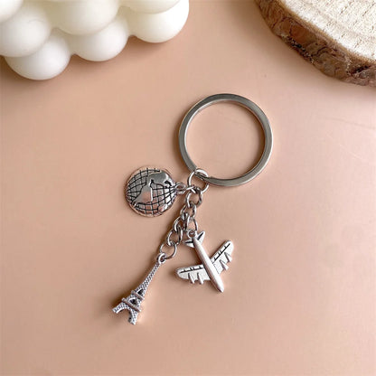 Elevate Your Style with the Luxe Tassel Chain Globe Iron Tower Airplane Keychain - Perfect for Bags & Backpacks!