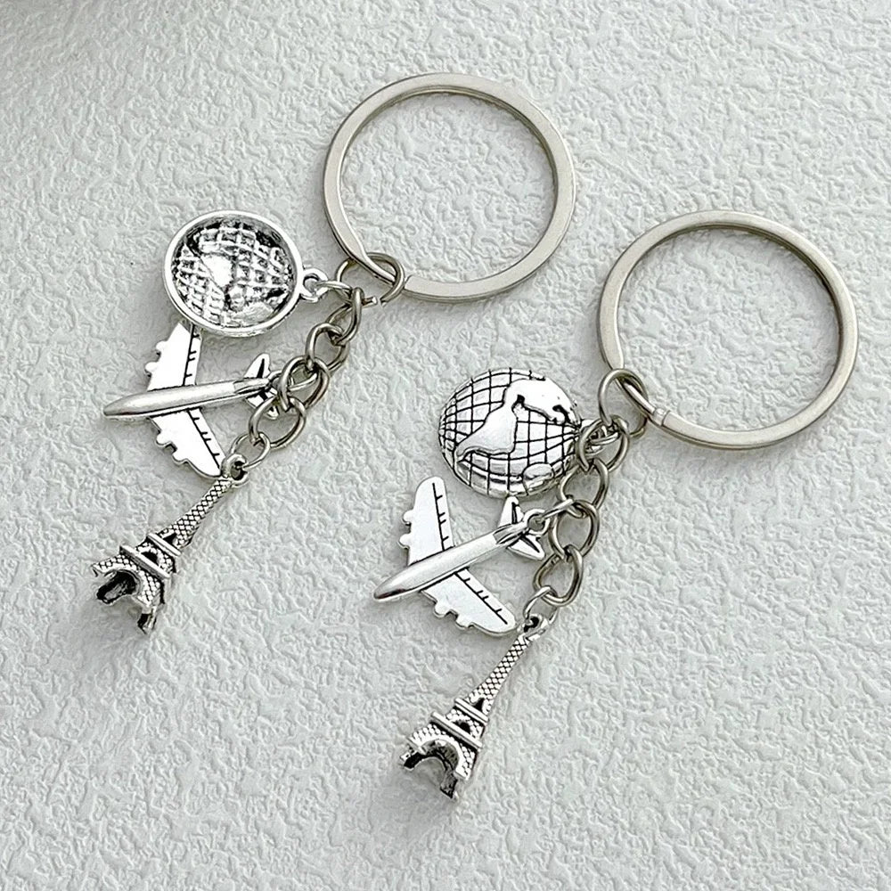 Elevate Your Style with the Luxe Tassel Chain Globe Iron Tower Airplane Keychain - Perfect for Bags & Backpacks!